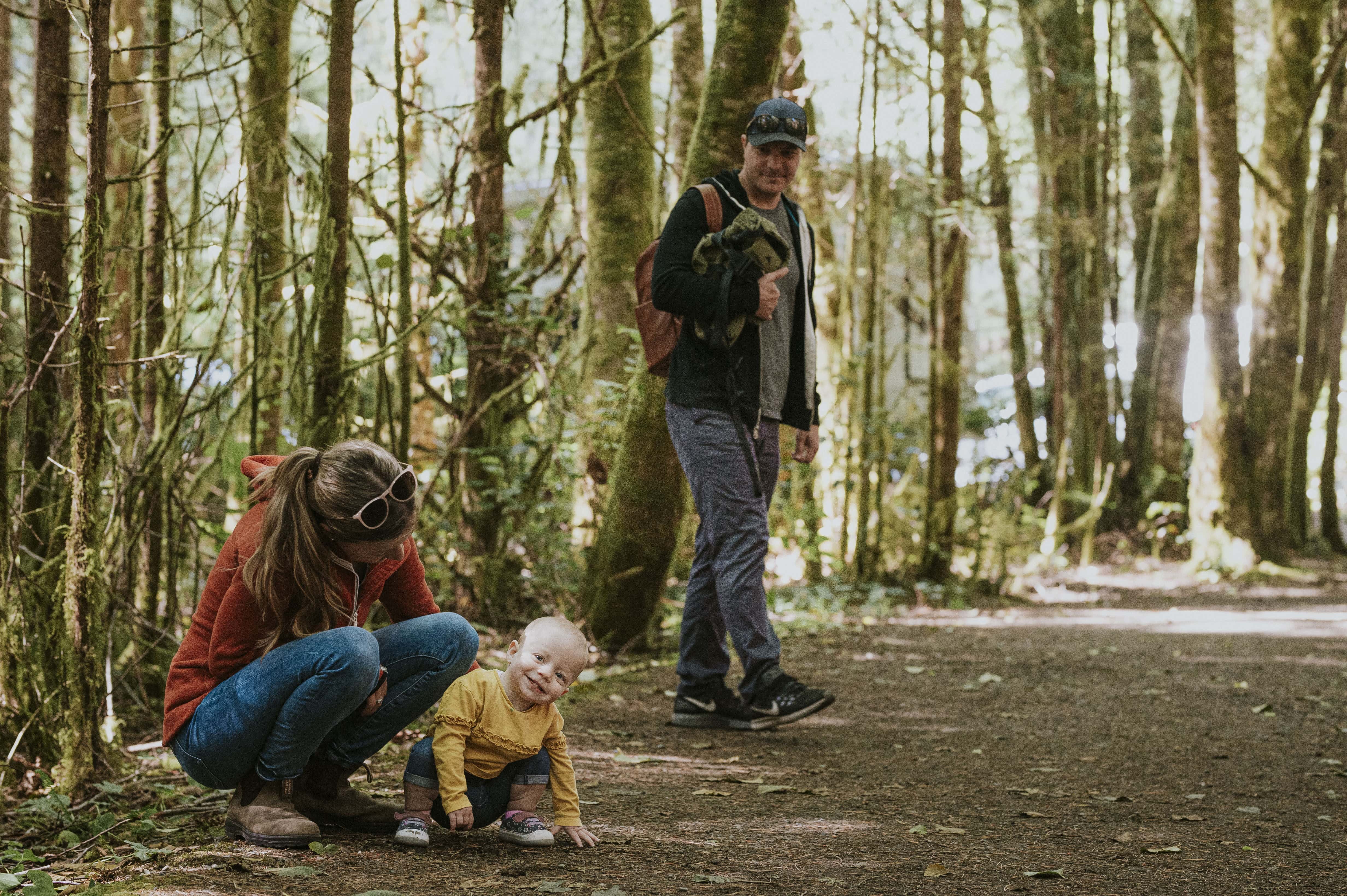 family in a forest in Tofino B.C.